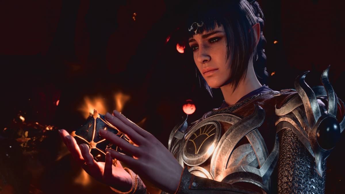 A cleric holds a glowing magical artifact in her hands.