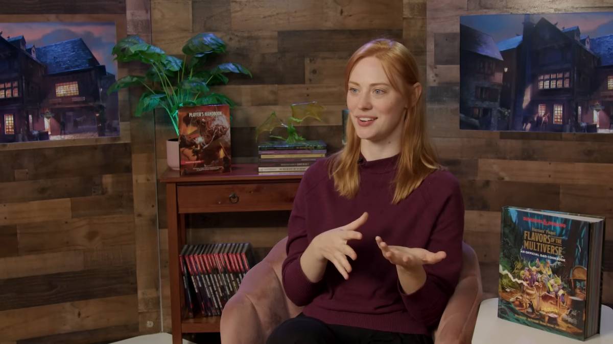 Deborah Ann Woll in a wood-paneled studio.